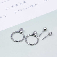 Round earrings in gold and silver