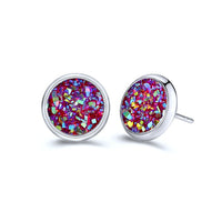 Round earrings in gold and silver