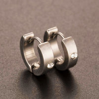 Round earrings in gold and silver