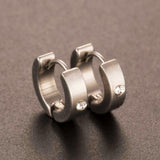 Round earrings in gold and silver