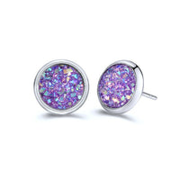 Round earrings in gold and silver