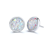 Round earrings in gold and silver