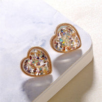 Round earrings in gold and silver