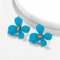 Round earrings in gold and silver