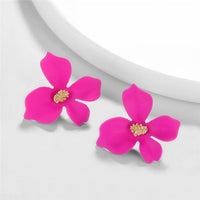 Round earrings in gold and silver