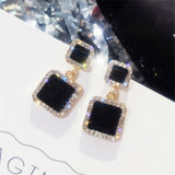 Round earrings in gold and silver