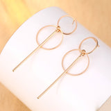 Round earrings in gold and silver