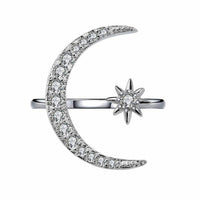 Moon-shaped ring studded with zircon crystals