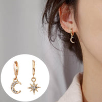 Asymmetric earrings of star and moon jewelry
