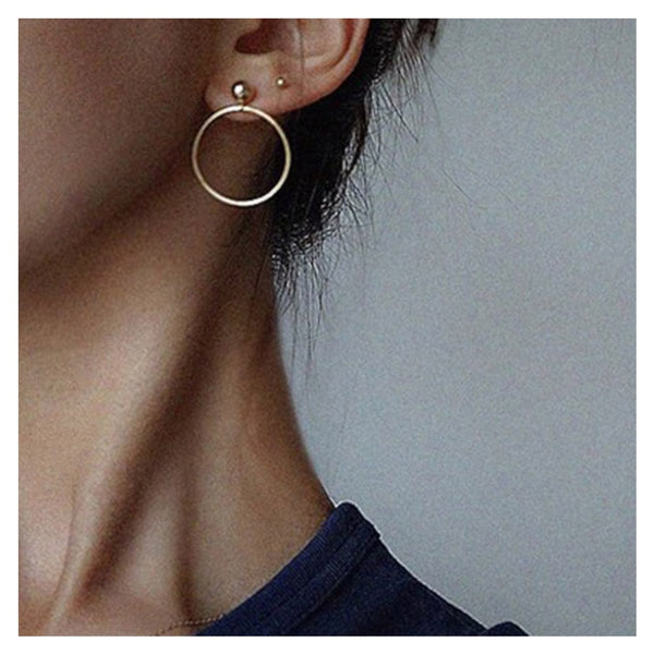Round earrings in gold and silver